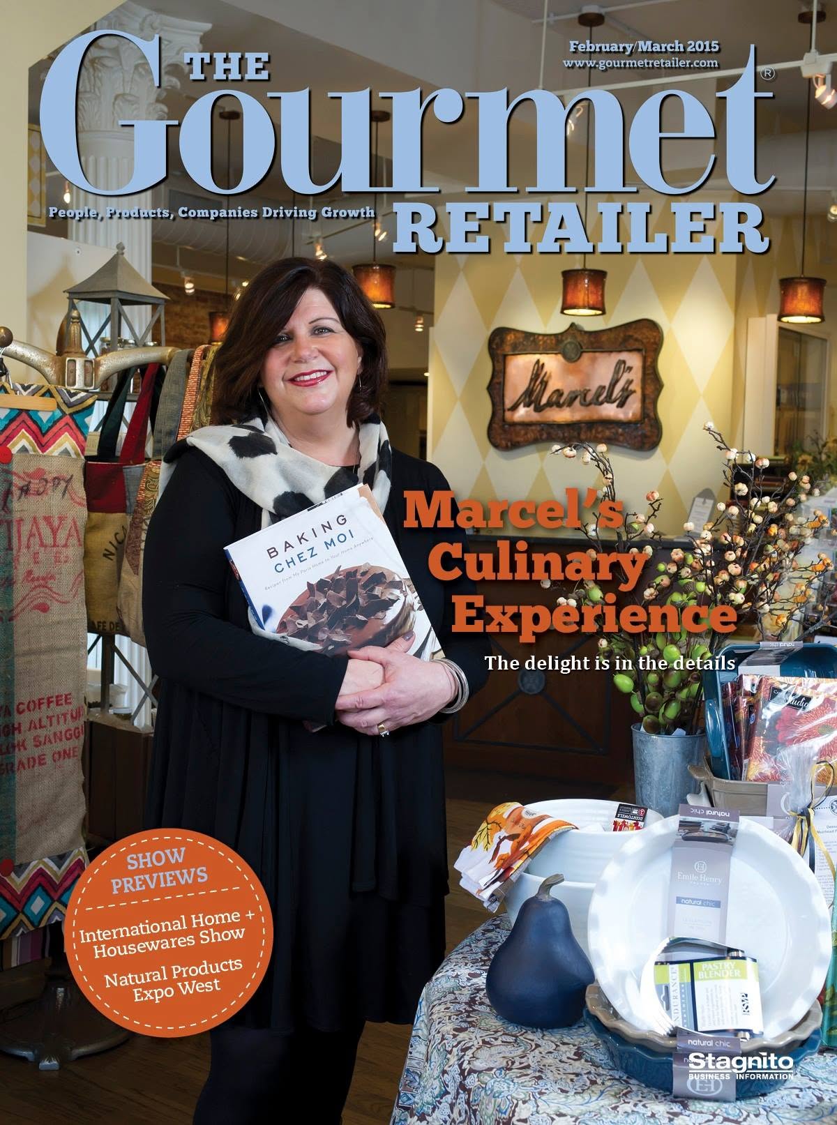 The Gourmet Retailer magazine cover from February/March 2015, featuring a woman holding a baking cookbook in a shop setting with the headline 'Marcel's Culinary Experience'.
