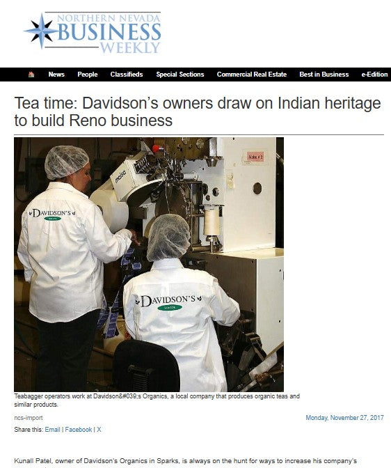 A screenshot of a Business Weekly article titled 'Tea time: Davidson's owners draw on Indian heritage to build Reno business,' featuring a photo of two workers in white Davidson's uniforms operating a large machine in a factory.