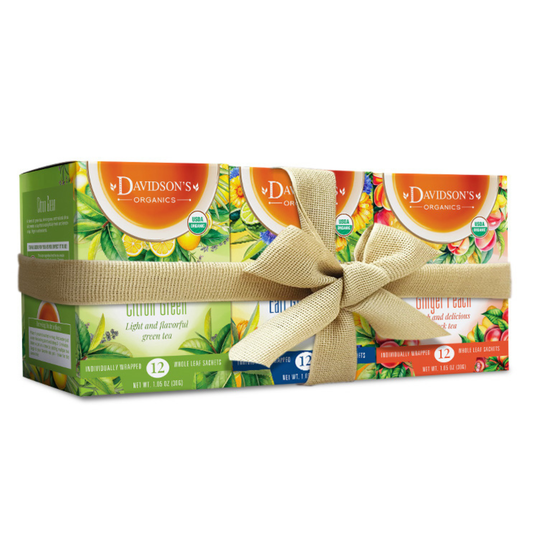3 Box of Davidson's Organics green tea with a decorative ribbon.