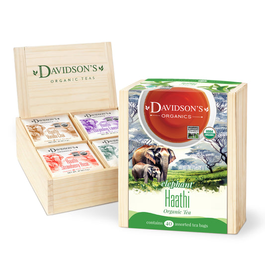 Davidson's Organic Teas packaging with wooden display and tea box featuring elephants.
