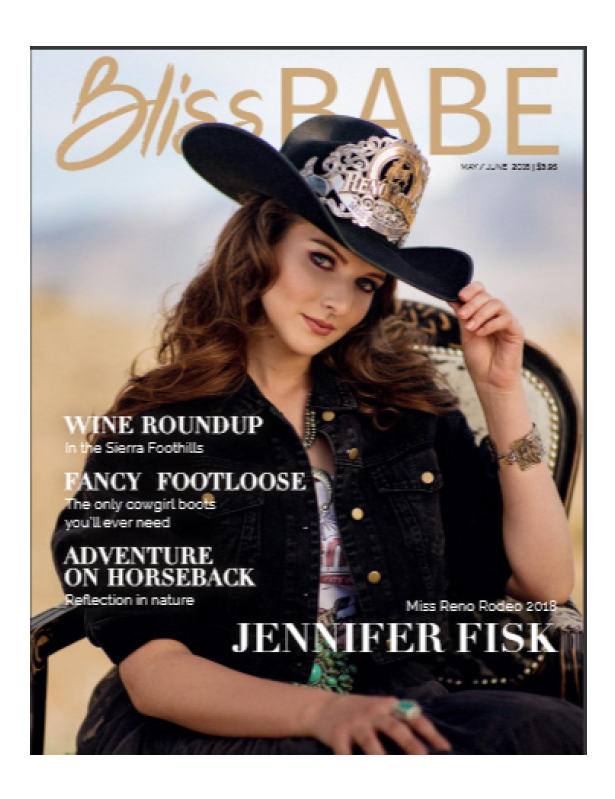 Magazine cover featuring a woman in a cowboy hat with text about wine, fashion, and adventure.