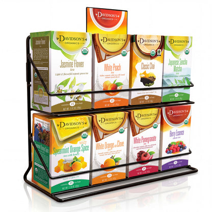 Display of Davidson's Tea boxes in a promotional stand on a white background