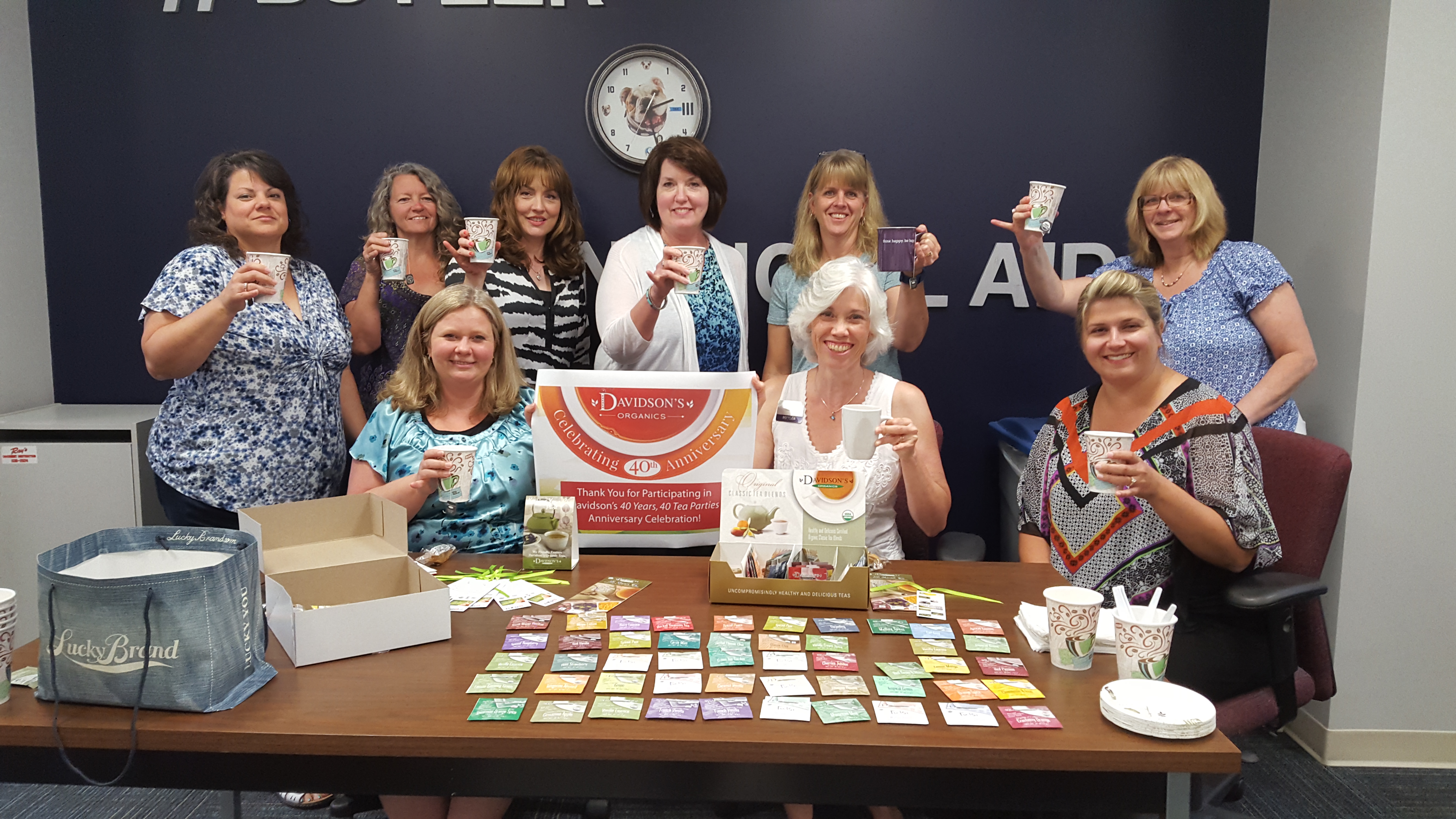 A group of women enjoying a Davidson's Tea party with samples.

