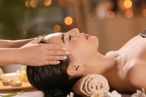 A person enjoys a soothing head massage or facial at a spa.